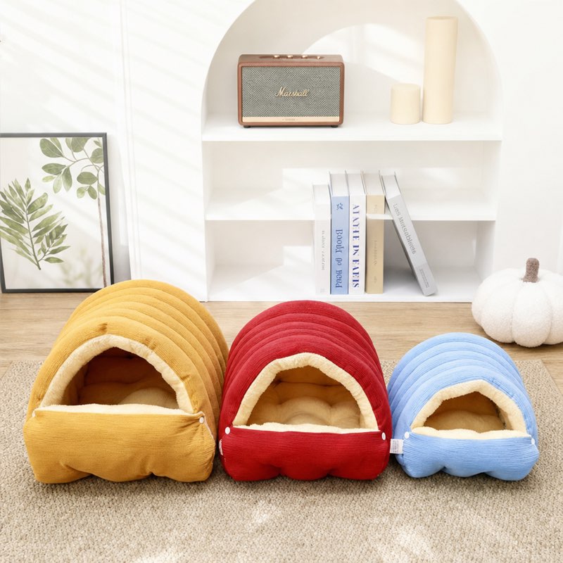 Yellow, red and blue Corduroy Frenchie Cave Beds side by side