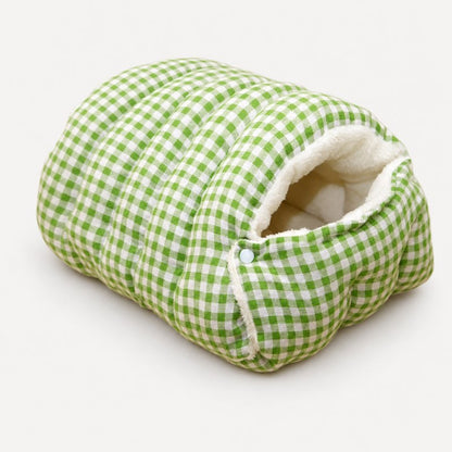 Green plaid Frenchie cave bed with sherpa lining and snap flap