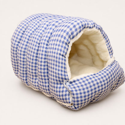 Blue plaid Frenchie cave bed with cream sherpa lining